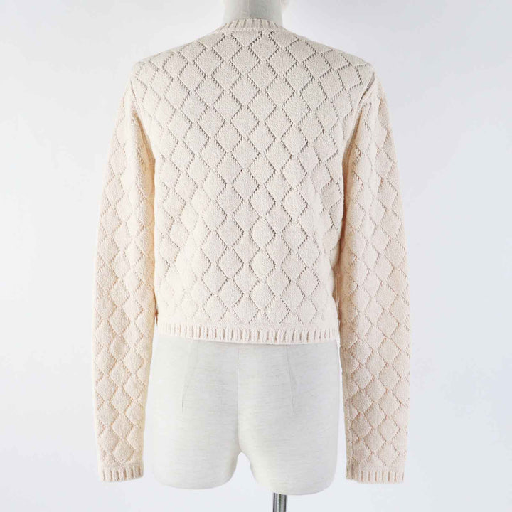 極美品◎CHANEL シャネル 23S P75071 ラインストーンココマークボタン付き クロップド丈 カーディガン ライトオレンジ 36 保存袋付き