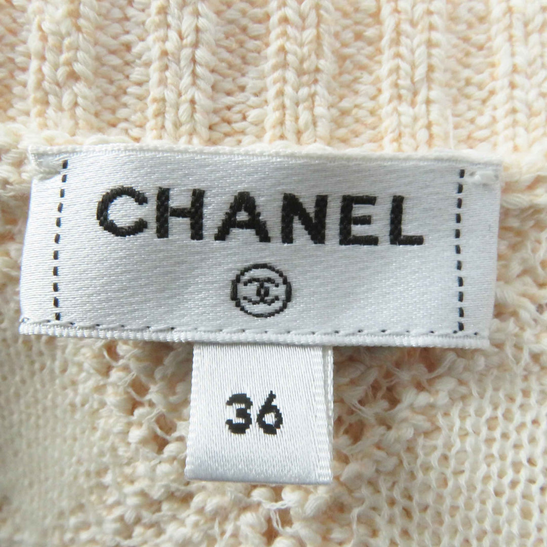 極美品◎CHANEL シャネル 23S P75071 ラインストーンココマークボタン付き クロップド丈 カーディガン ライトオレンジ 36 保存袋付き