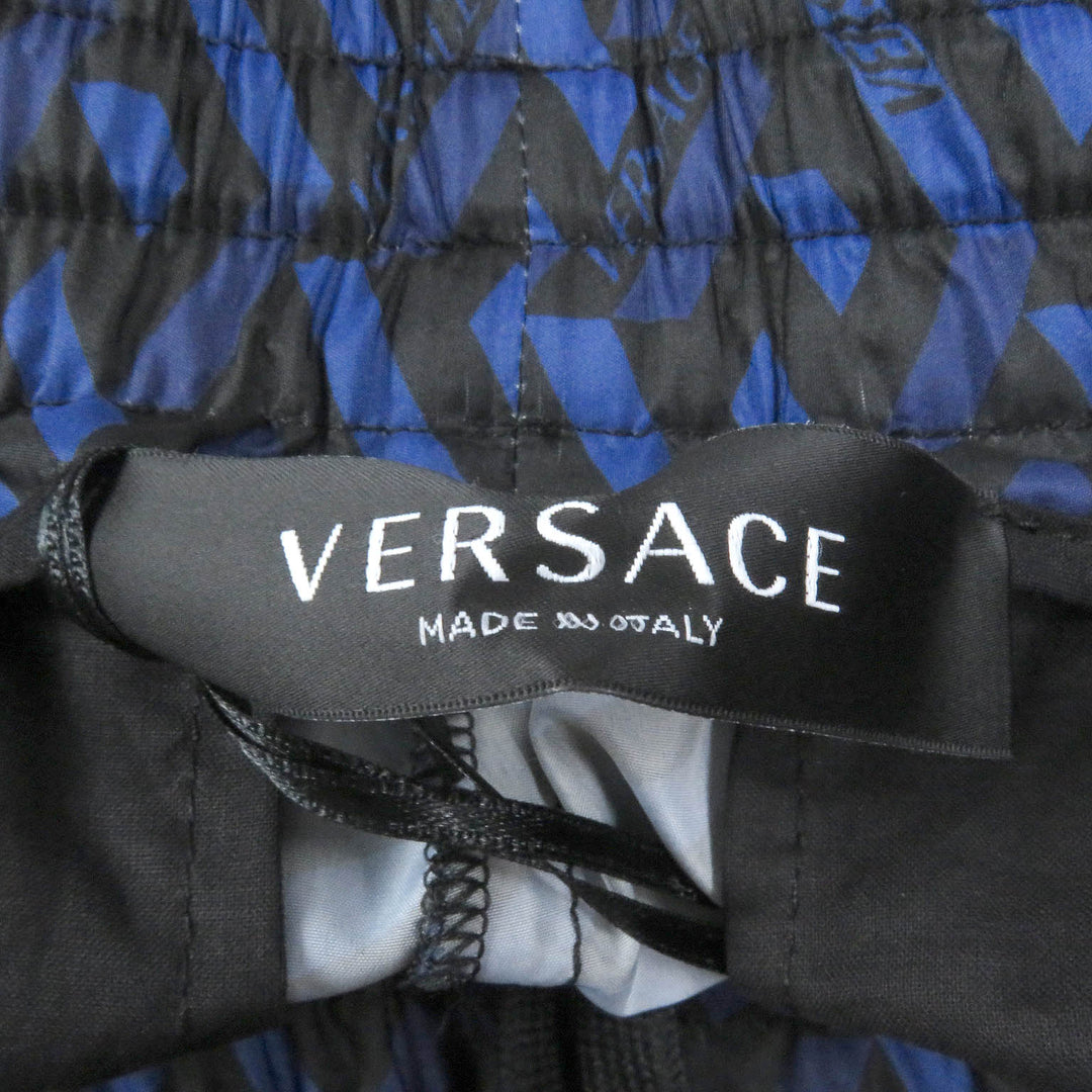 未使用品□VERSACE ヴェルサーチ 2021年製 1002482 ロゴ総柄 ナイロンジョガーパンツ トラックパンツ ネイビー 52 イタリア製 正規品