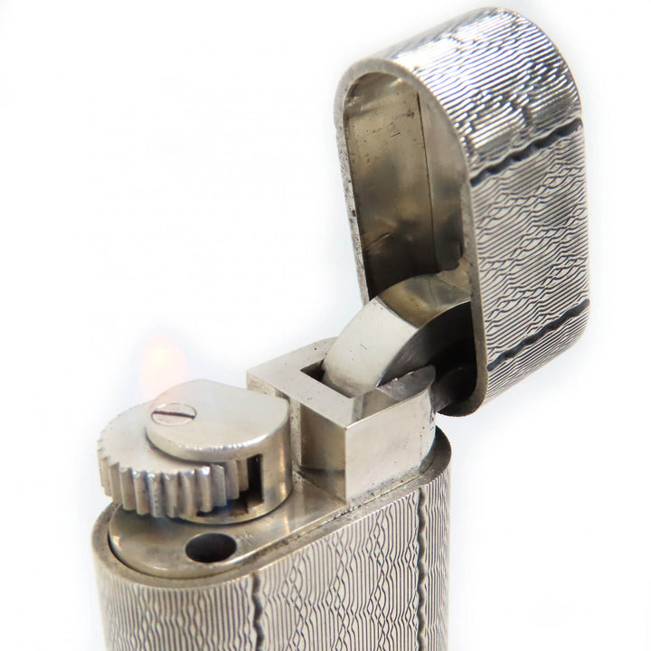良品△Cartier カルティエ 総柄 格子柄 オーバル ローラー式 ガスライター 喫煙グッズ ライター シルバー メンズ 着火確認済み