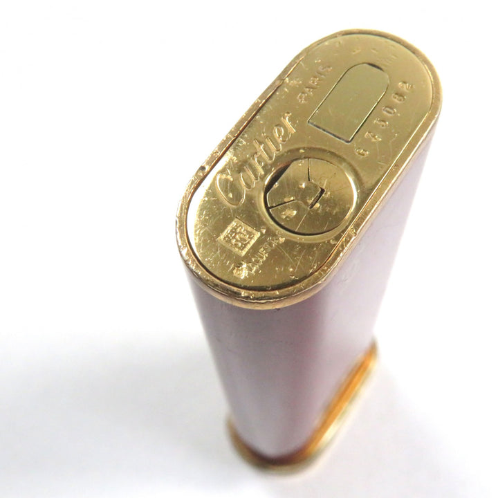 良品○Cartier カルティエ トリニティ ラッカー オーバルフォルム ローラー式 喫煙グッズ ガスライター ボルドー ゴールド 着火確認済