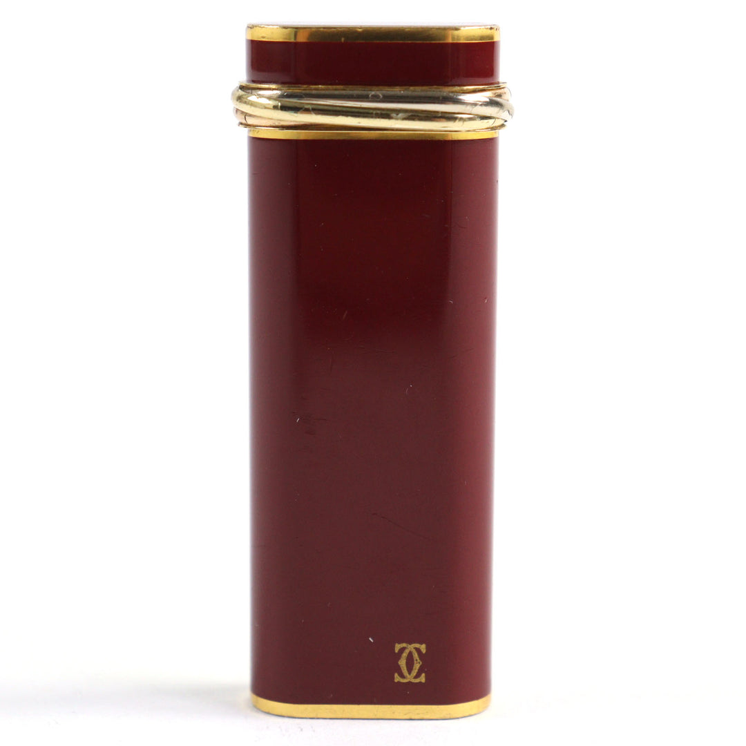 良品○Cartier カルティエ トリニティ ラッカー オーバルフォルム ローラー式 喫煙グッズ ガスライター ボルドー ゴールド 着火確認済