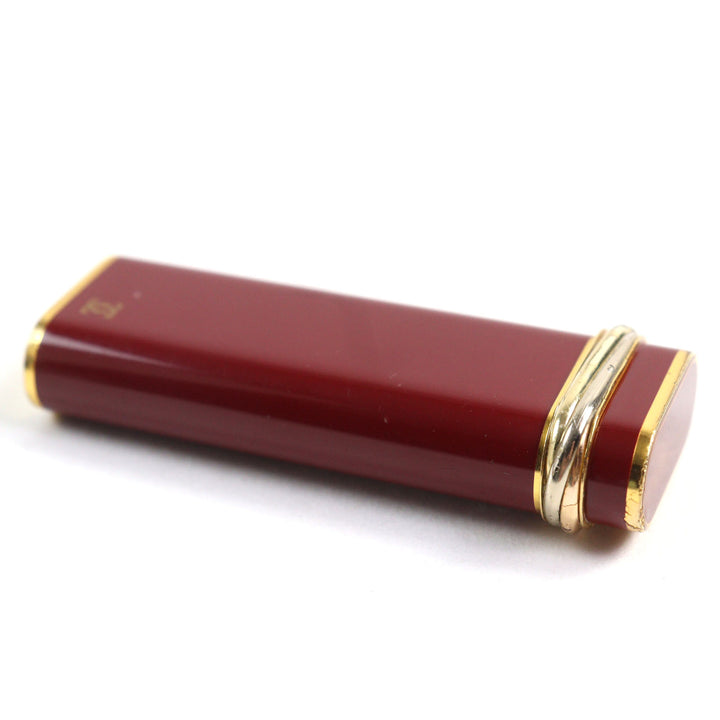 良品○Cartier カルティエ トリニティ ラッカー オーバルフォルム ローラー式 喫煙グッズ ガスライター ボルドー ゴールド 着火確認済