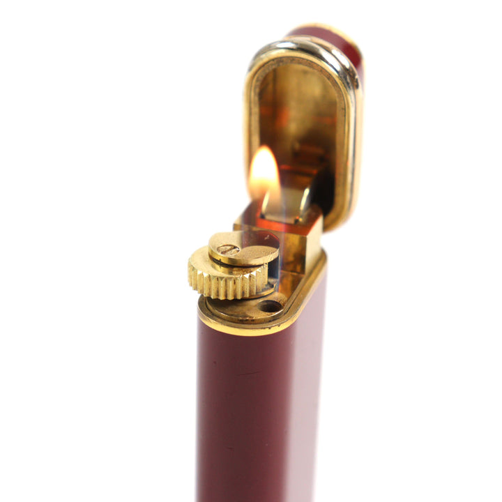 良品○Cartier カルティエ トリニティ ラッカー オーバルフォルム ローラー式 喫煙グッズ ガスライター ボルドー ゴールド 着火確認済