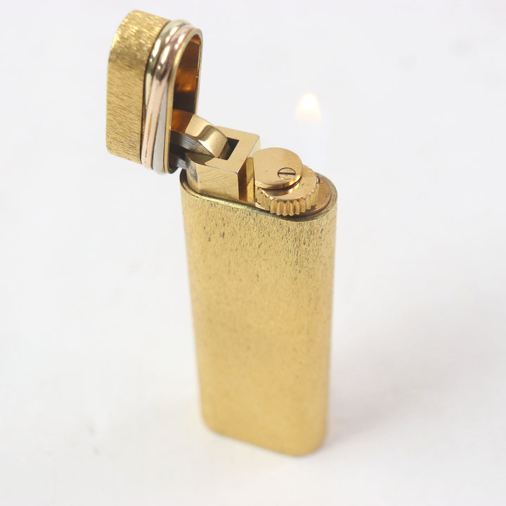 良品□Cartier カルティエ トリニティ オーバル型 ローラー式 ガスライター 喫煙具 ゴールド スイス製 メンズ レディース 着火確認済み