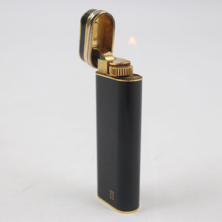 良品▼Cartier カルティエ トリニティ 新型 オーバル ラッカー ロゴ入り ローラー式 ガスライター ブラック ゴールド スイス製 着火◎