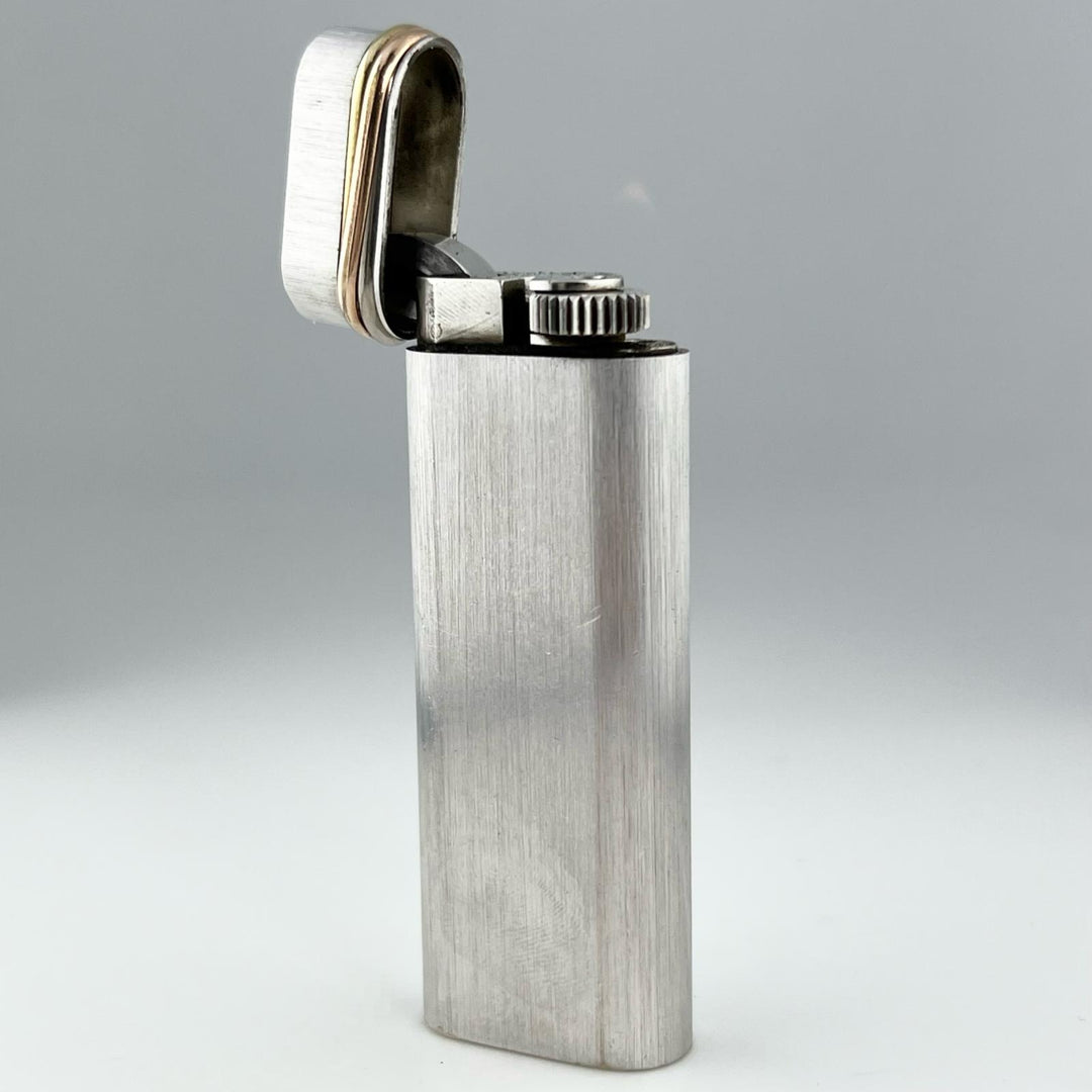 美品▲Cartier カルティエ トリニティ ヘアライン オーバル型 ローラー式 ガス ライター シルバー ゴールド スイス製 メンズ 着火確認済