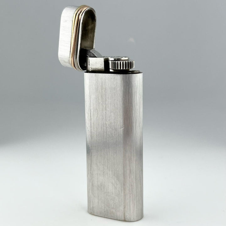 美品▲Cartier カルティエ トリニティ ヘアライン オーバル型 ローラー式 ガス ライター シルバー ゴールド スイス製 メンズ 着火確認済