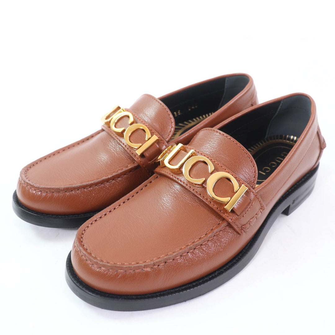 未使用品☆GUCCI グッチ 700036 ロゴメタル レザー ローファー ブラウン ゴールド金具 35 箱・保存袋付き イタリア製 レディース
