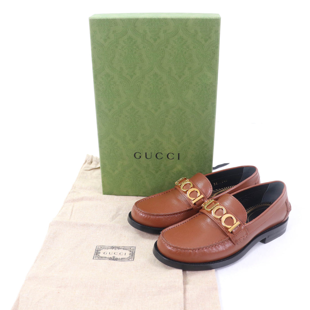 未使用品☆GUCCI グッチ 700036 ロゴメタル レザー ローファー ブラウン ゴールド金具 35 箱・保存袋付き イタリア製 レディース
