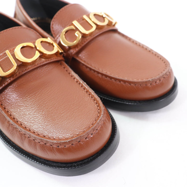 未使用品☆GUCCI グッチ 700036 ロゴメタル レザー ローファー ブラウン ゴールド金具 35 箱・保存袋付き イタリア製 レディース
