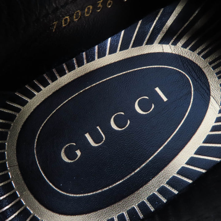 未使用品☆GUCCI グッチ 700036 ロゴメタル レザー ローファー ブラウン ゴールド金具 35 箱・保存袋付き イタリア製 レディース