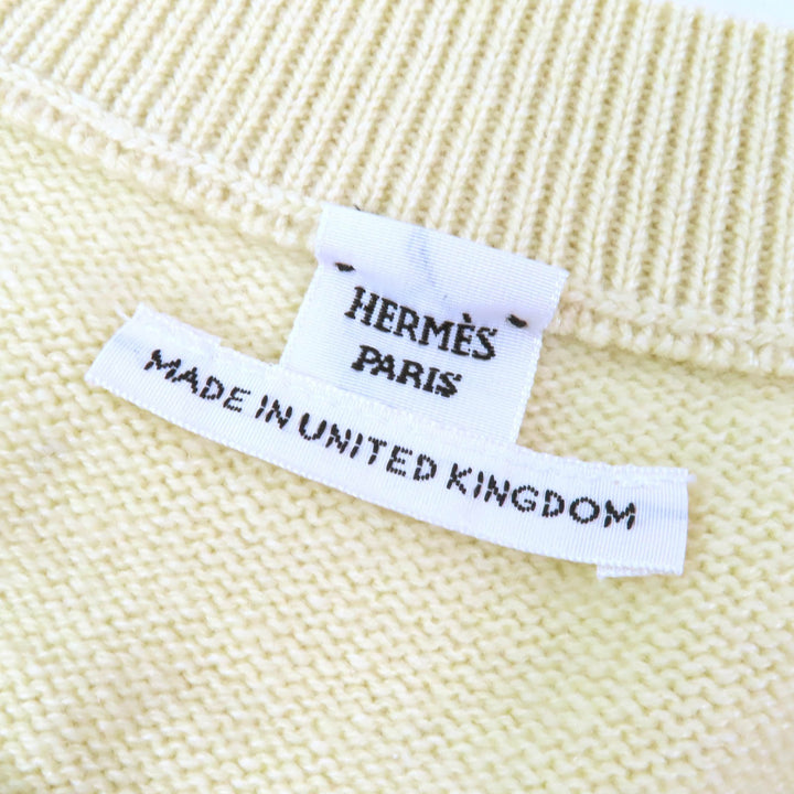 極美品△HERMES エルメス 22AW 2H2603D1 カシミヤ100％ セリエボタン 長袖 オーバーサイズ セーター ニット イエロー系 38 英国製 正規品