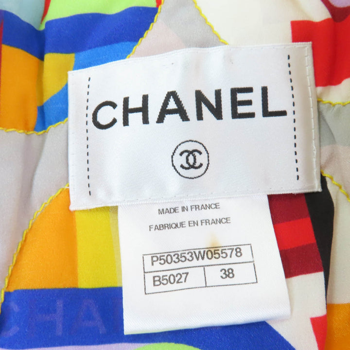 美品☆CHANEL シャネル P50353W05578 ウール100％ 裏地ロゴ総柄 クリスタルボタン ツイード コート イエロー 38 フランス製 レディース