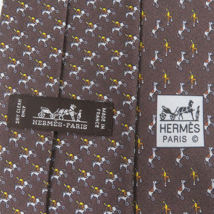 極美品□HERMES エルメス 625657 シルク100％ Jockey&amp;Toy Horse 総柄 レギュラータイ ネクタイ ブラウン 箱付き フランス製 メンズ