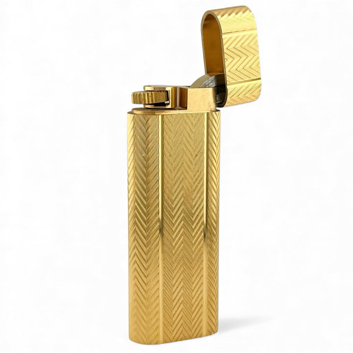 良品▲Cartier カルティエ オーバル ヘリンボーン柄 ローラー式 喫煙具 ガス ライター ゴールド メンズ 着火確認済み