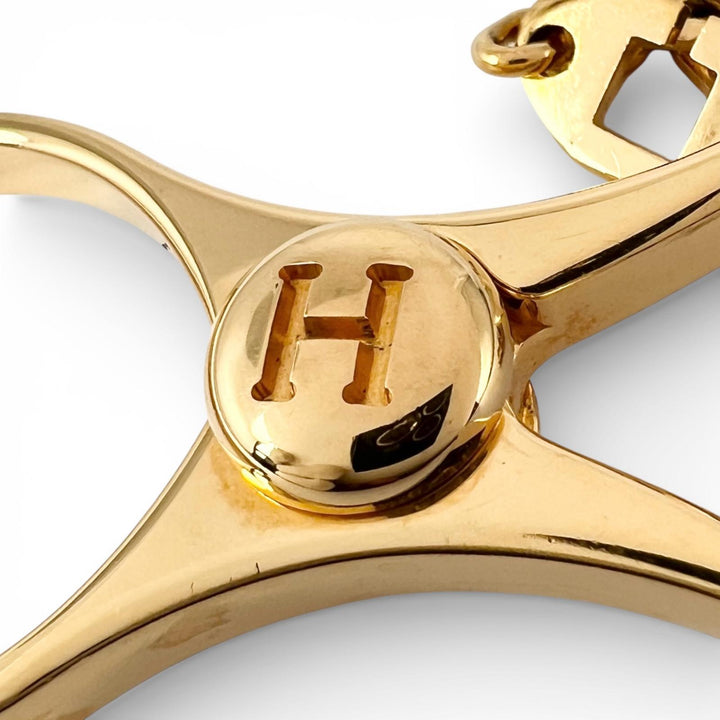 美品▲HERMES エルメス Filou フィルー Hロゴ グローブホルダー キーホルダー チャーム ゴールド レディース