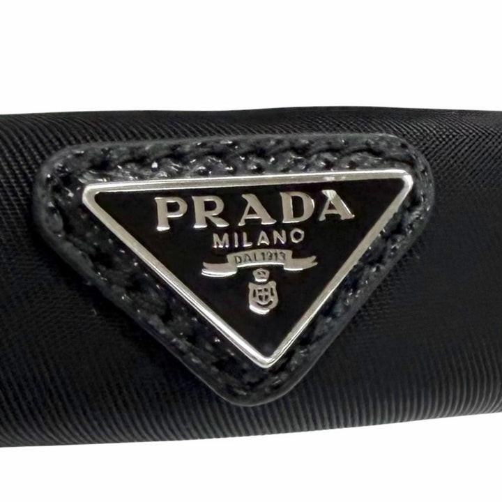 美品△PRADA プラダ 1IH020 トライアングルロゴ Re-Nyron カチューシャ ヘアアクセサリー ヘアバンド ブラック レディース 箱・保存袋付