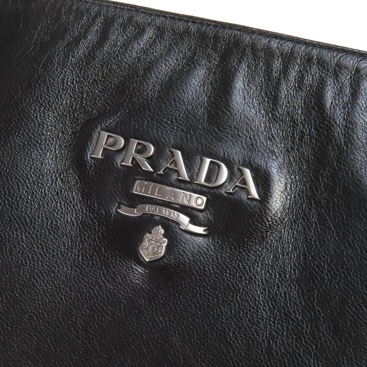 美品△PRADA プラダ ロゴ金具 サイドジップ レザー ロングブーツ チャンキーヒール ブラック 37.5 イタリア製 レディース