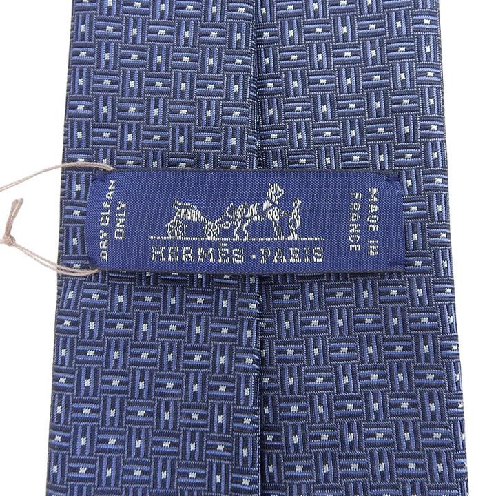 未使用品▲HERMES エルメス 339354T Hデコ シルク100％ Hロゴ総柄 シルクツイルタイ ネクタイ ネイビー フランス製 メンズ 箱付き