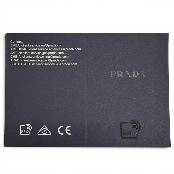 極美品▲PRADA プラダ 1MC223 サフィアーノレザー 三角プレート トライアングルロゴ カードケース シルバー 箱付き イタリア製 レディース
