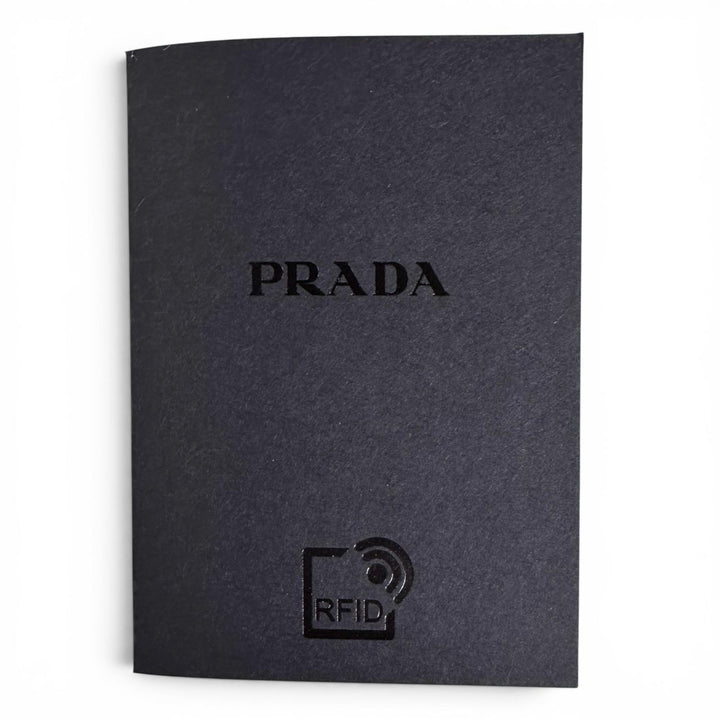 極美品▲PRADA プラダ 1MM006 PORTAMONETE ヴィッテロダイノトライアングルロゴ ラウンド コインケース ホワイト 伊製 レディース 箱付き