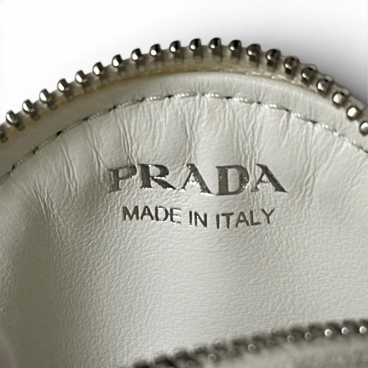 極美品▲PRADA プラダ 1MM006 PORTAMONETE ヴィッテロダイノトライアングルロゴ ラウンド コインケース ホワイト 伊製 レディース 箱付き