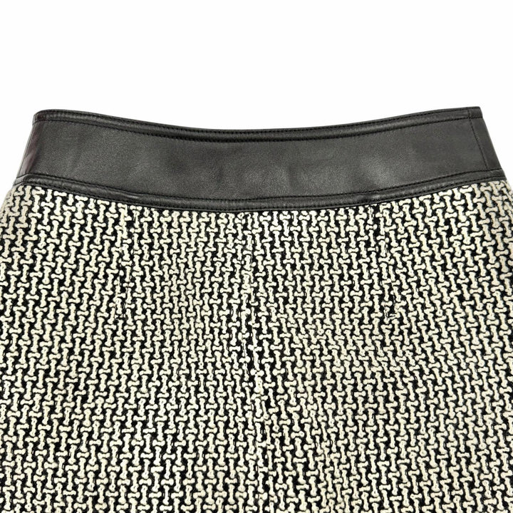 未使用品◇LOUIS VUITTON ルイヴィトン 23AW ウール レザー切替 裏地モノグラム ツイードスカート ブラック ホワイト 36 伊製 正規品