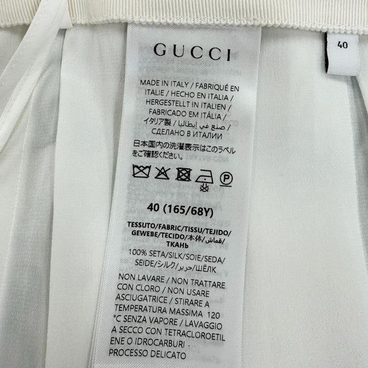 未使用品☆GUCCI YUKO HIGUCHI グッチ ヒグチユウコ 26SS 865513 シルク100％ 日本限定 ロング丈 プリーツスカート ホワイト系 40 正規品