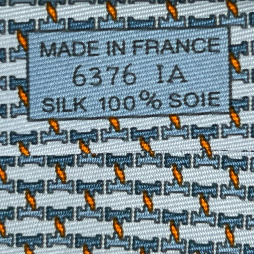 未使用品▲HERMES エルメス 2025年製 006376T H TWIST シルク100% ネクタイ ライトブルー オレンジ フランス製 メンズ 箱付き