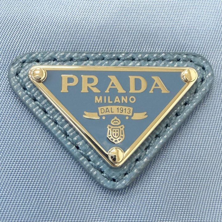 極美品□PRADA プラダ 1NS369 トライアングルロゴ Re-Nylon 一部レザー 巾着バッグ ハンドバッグ ライトブルー イタリア製 メンズ