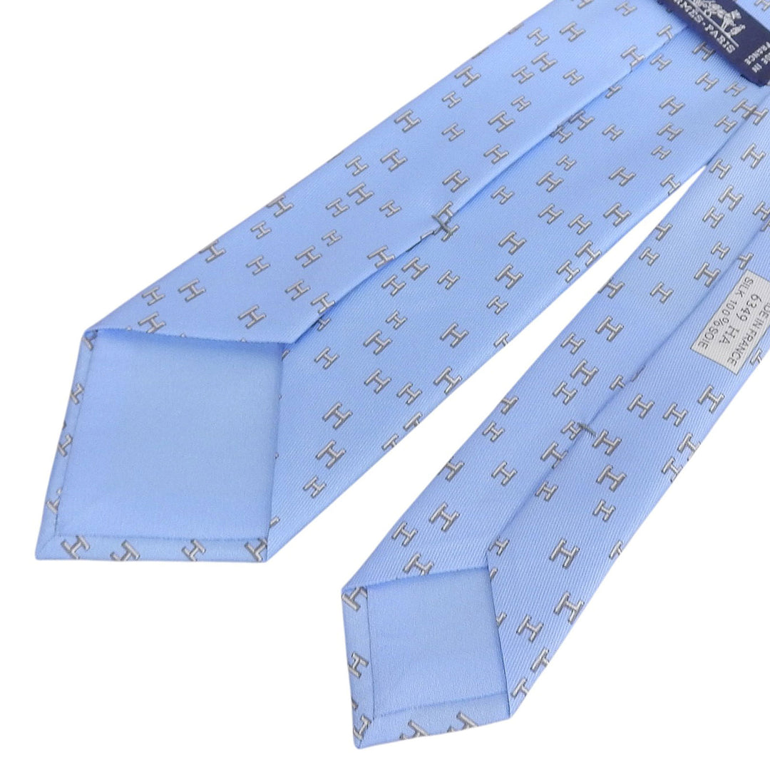 極美品▲HERMES エルメス 6349HA シルク100% H総柄 ラビット スポーツ 表彰台 ネクタイ ライトブルー グレー フランス製 メンズ 箱付き