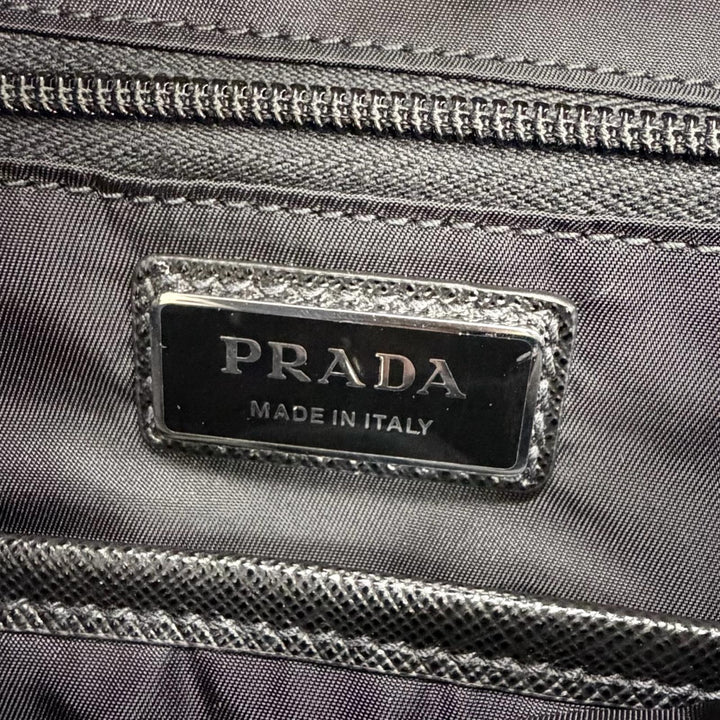 極美品△PRADA プラダ 2VZ019 トライアングルロゴ Re-Nylon レザー使い リュックサック デイパック ブラック 定価616000円 保存袋付き