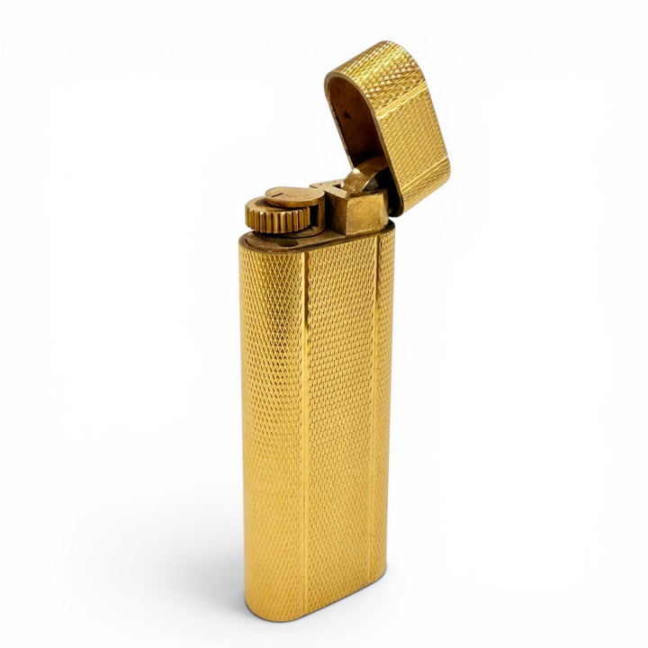 美品◇Cartier カルティエ オーバル型 総柄 ローラー式 ガスライター 喫煙具 ゴールド スイス製 メンズ 着火確認済み