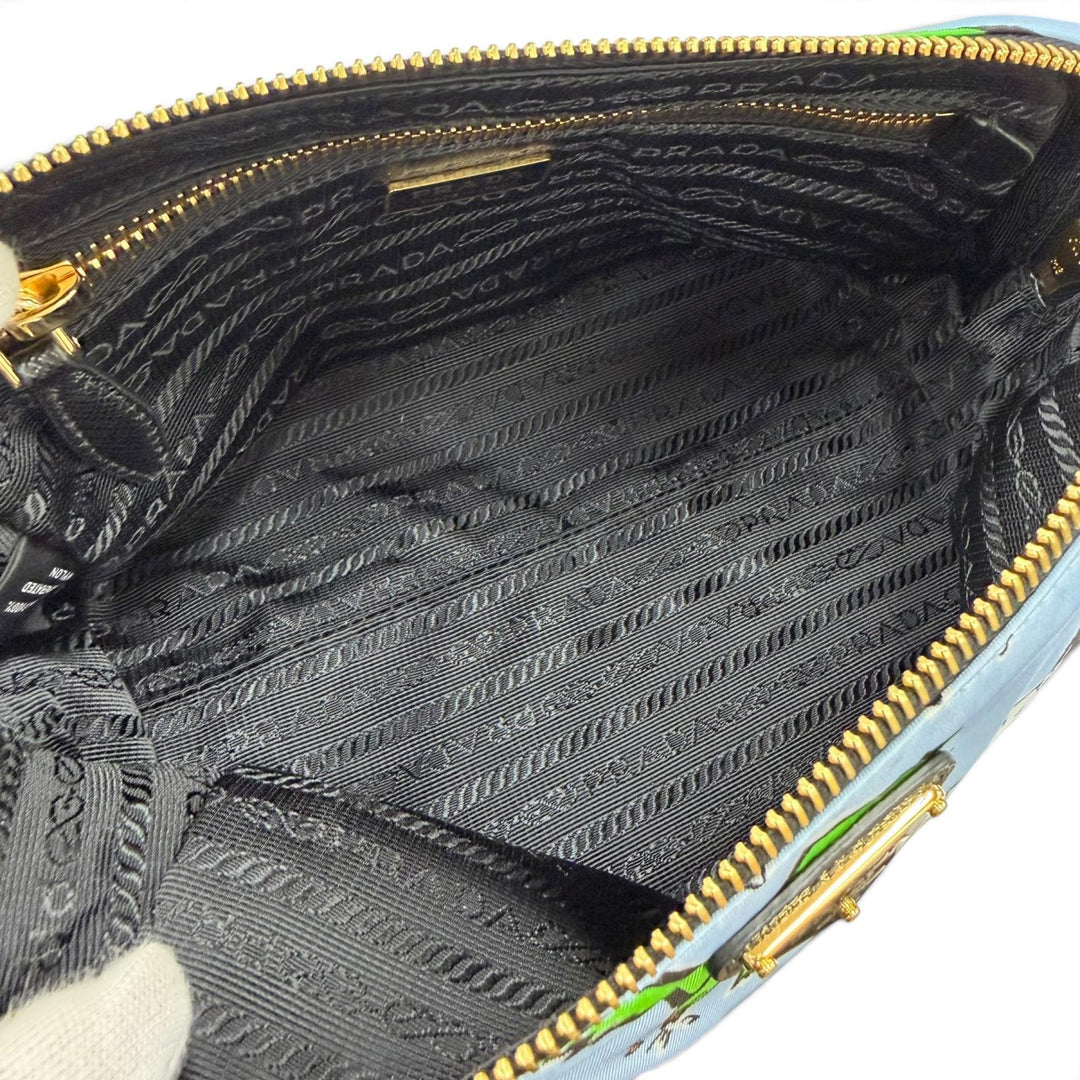 極美品☆PRADA プラダ 1NS693 トライアングルロゴ Re-Nylon サーフプリント リストレット付 化粧ポーチ ブルー イタリア製 箱付き