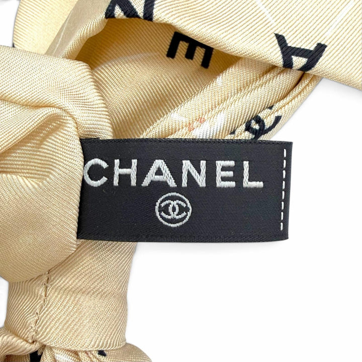 極美品△CHANEL シャネル AA9304 シルク100% ココマーク ロゴ 総柄 リボン付き シュシュ ヘアゴム ヘアアクセサリー ベージュ イタリア製