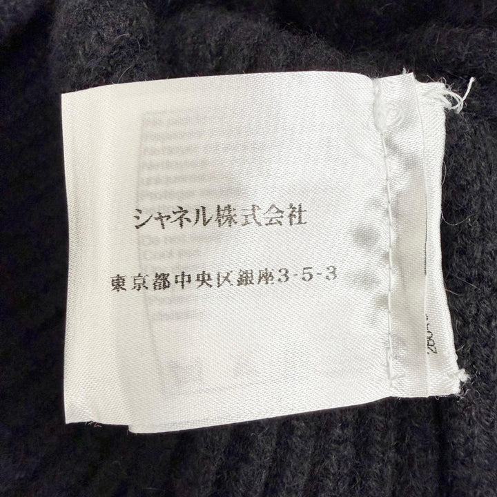 極美品△CHANEL シャネル P50069K06343 カシミヤ100％ ココマーク ライオン金具 カメリアデザイン 長袖 ニット セーター 黒 38 正規品