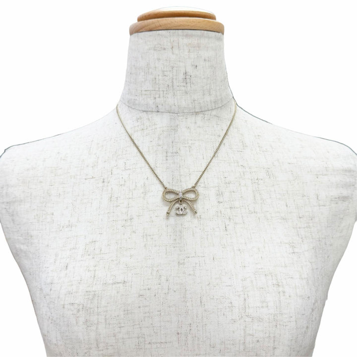 極美品△CHANEL シャネル B24K ABE650 ココマークラインストーン リボン ネックレス アクセサリー ゴールド イタリア製 レディース 箱付