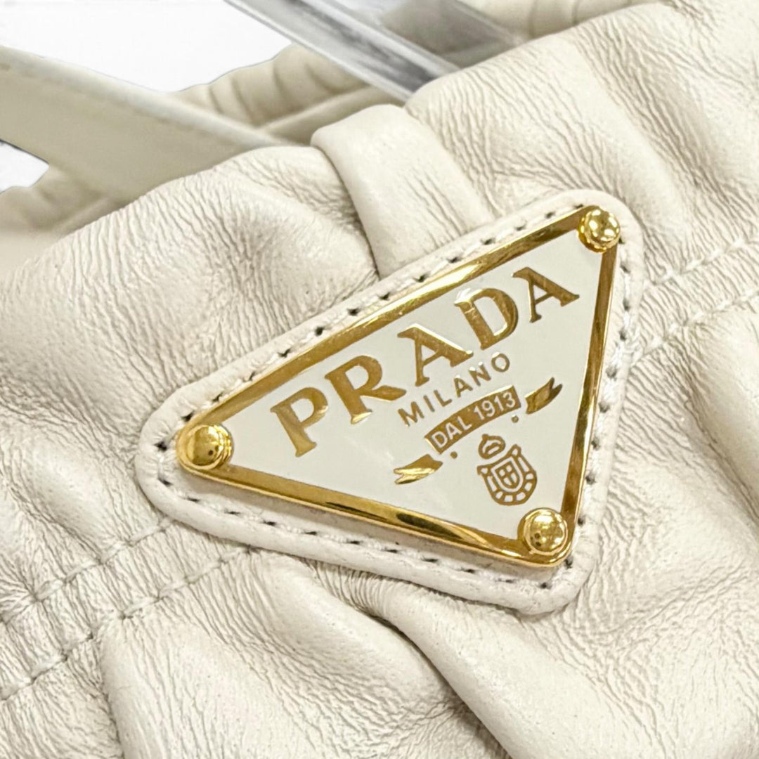 美品△PRADA プラダ 26SS 1XZ796 マテラッセレザー フラットフォーム サンダル トライアングルロゴ ホワイト ゴールド金具 37 伊製 袋付